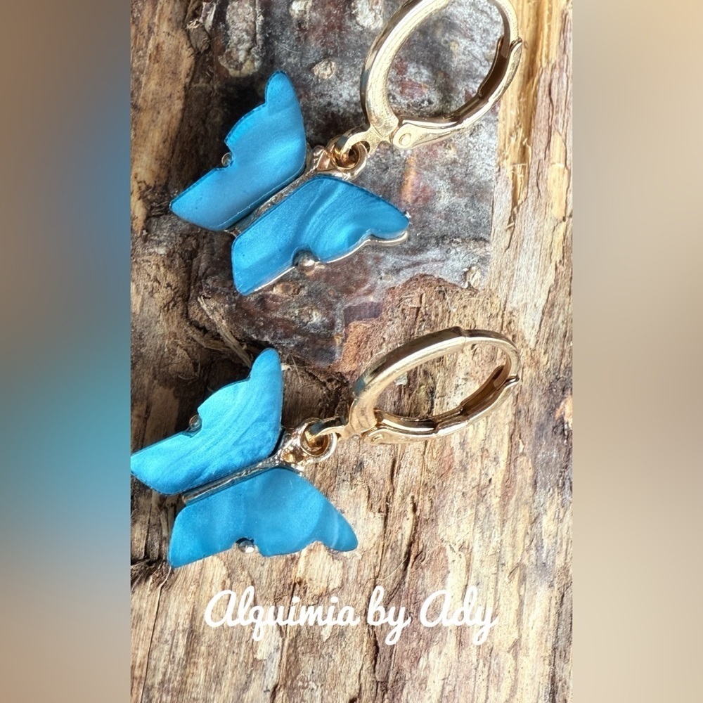 Gold and blue butterfly dangle earrings